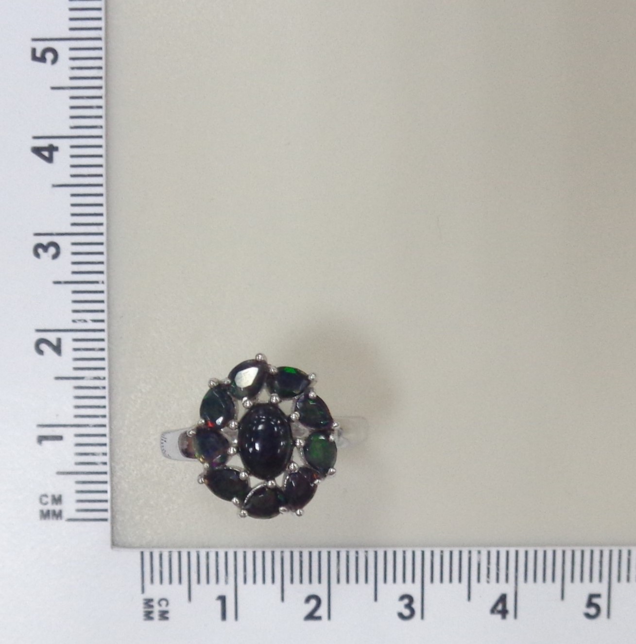 Серебряное кольцо с черными опалами "Цветок"